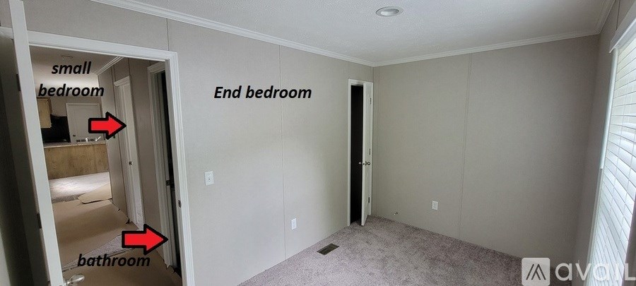 A room with a small bedroom, an end bedroom, and a bathroom.
