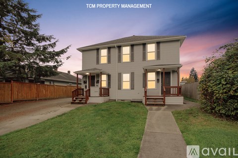 A house with the text "TCM PROPERTY MANAGEMENT" on the top left corner.