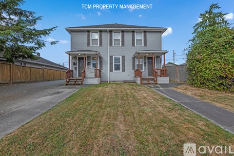 A house with the text "TCM PROPERTY MANAGEMENT" on the top right corner.