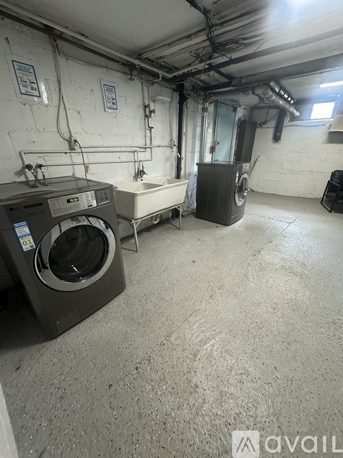 A laundry room with a washer and dryer.