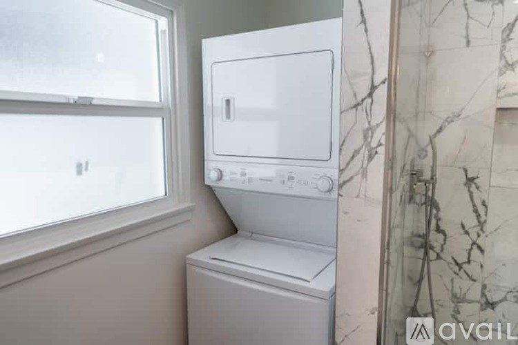 A white dishwasher is installed in a kitchen.