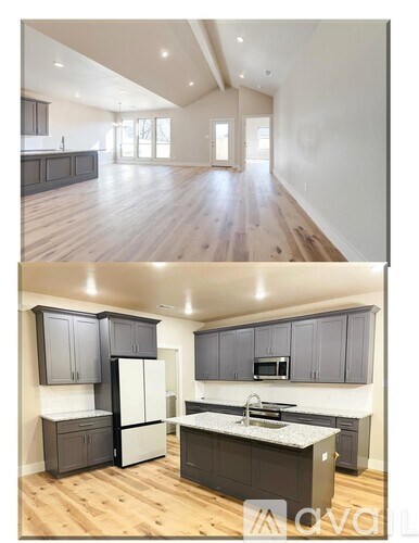 A kitchen with dark wood cabinets and a white countertop.