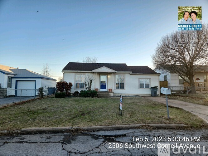 A house with a yard and a sign that says "MARKET-ONE FINAL SALE FINISHED".