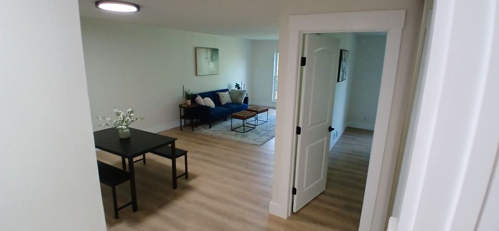 A living room with a couch and a coffee table.