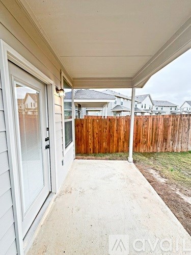 A white door is on the left and a white wall is on the right.