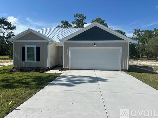 A two-car garage with a metal roof is available for rent.