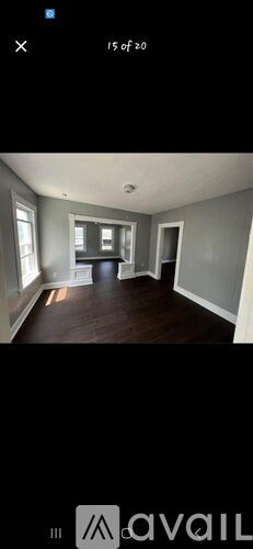 A room with a window and a door is shown.