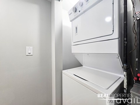 A white dishwasher is installed in a kitchen.