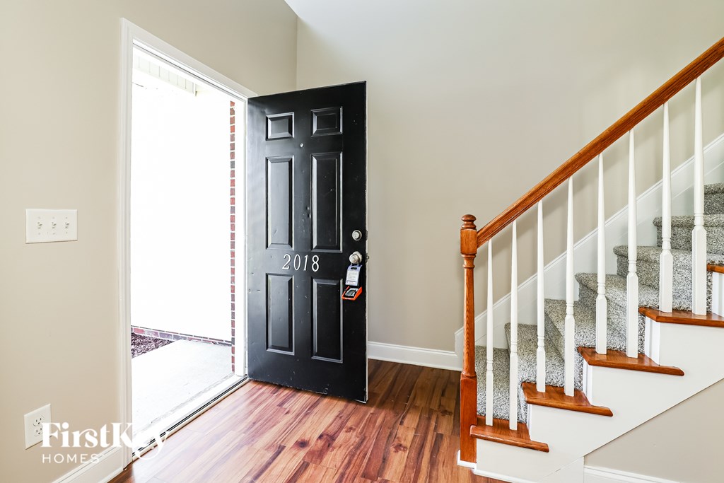 A black door with the year 2013 written on it.