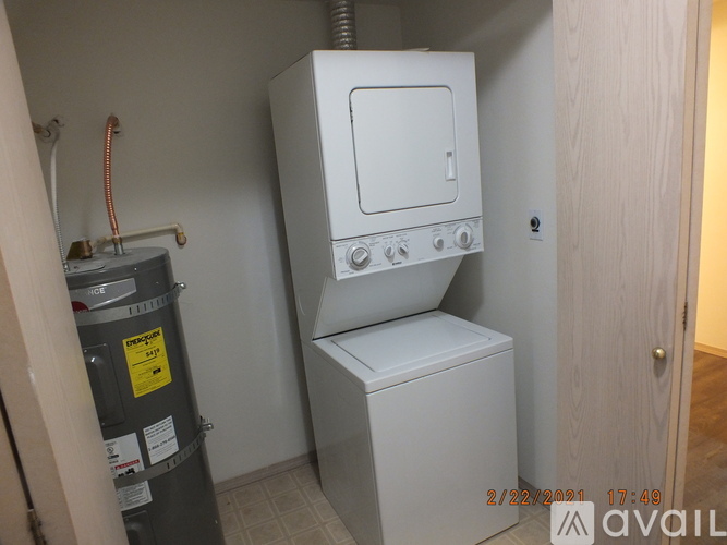 A white oven and stove in a small kitchen.