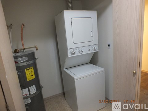 A white oven and stove in a small kitchen.