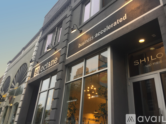 A storefront with a sign that says "business accelerated" above the entrance.