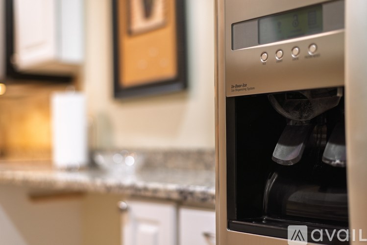 A modern stainless steel oven with a digital display and control panel is available for purchase.