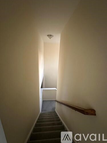 A stairway with a light at the top.