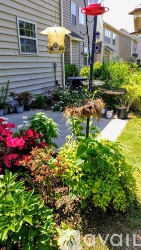 A garage with a lot of boxes and a white door.