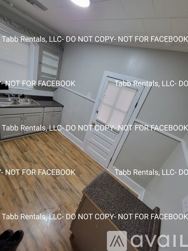 A kitchen rental listing with a caution not to copy or post on Facebook.