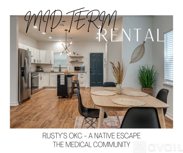 A well-lit kitchen with a dining table and chairs.