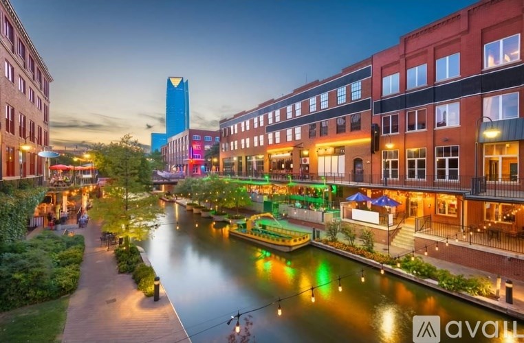 A river runs through a city with buildings on either side.