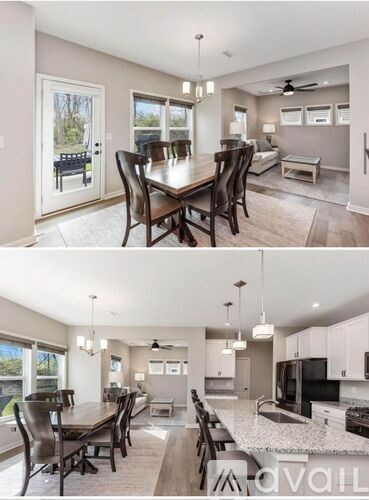 A modern kitchen and dining area with a large table and chairs.