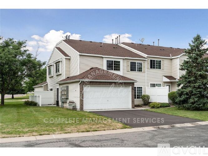 A house with a sign that says "COMPLETE MANAGEMENT SERVICES" in front of it.