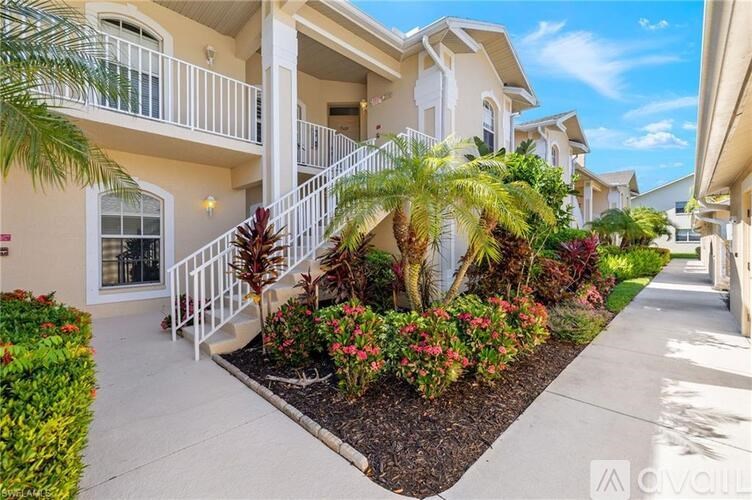 A row of houses with a landscaped front yard.