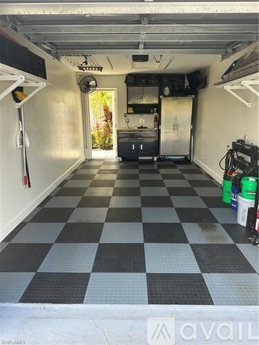 A black and white checkered floor in a garage.