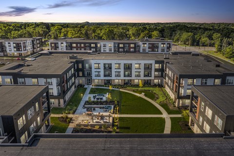A large apartment complex with a courtyard in the center.