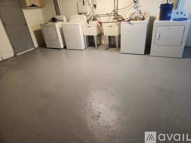 A room with a floor that has a lot of water on it.