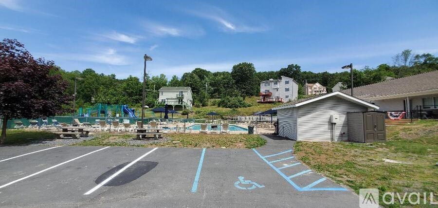 A parking lot with a handicap parking space.
