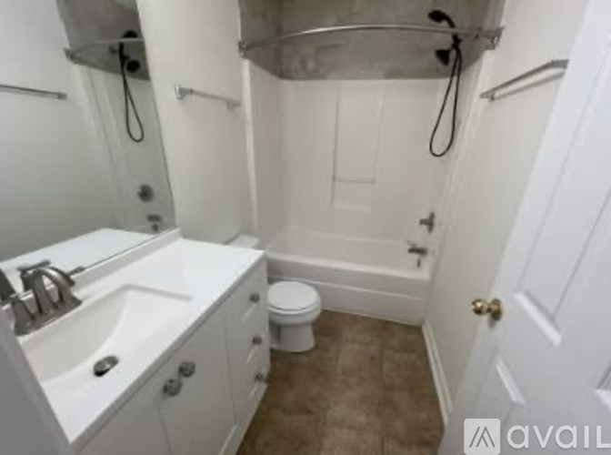 A small bathroom with a toilet and a sink.