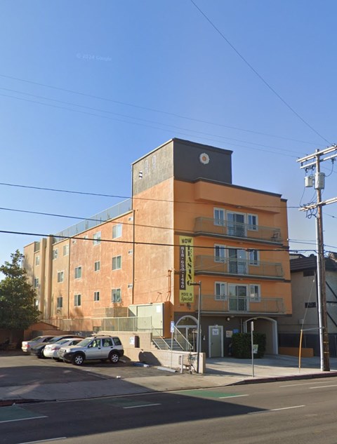 A building with a sign that says "Hotel" on it.