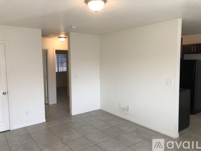 A room with a door and a window.