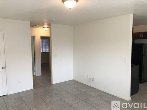 A room with a door and a window.