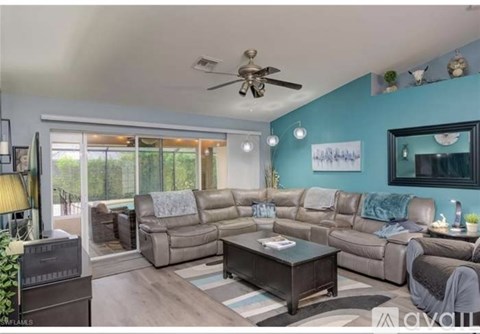 A living room with a sofa set and a coffee table.