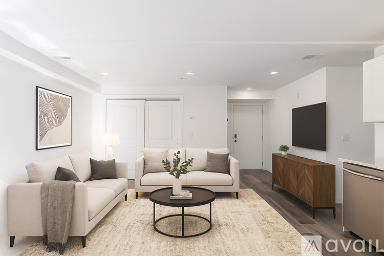 A room with wooden floors and white walls.