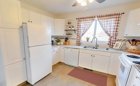 A room with wooden floors and a window.