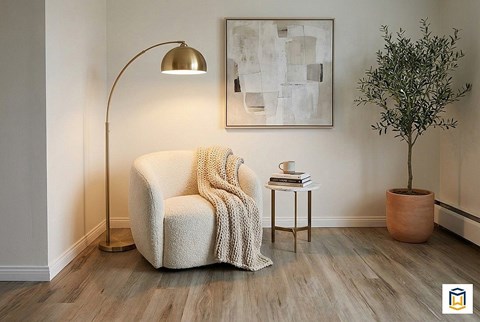 A spacious room with a carpeted floor and white walls.