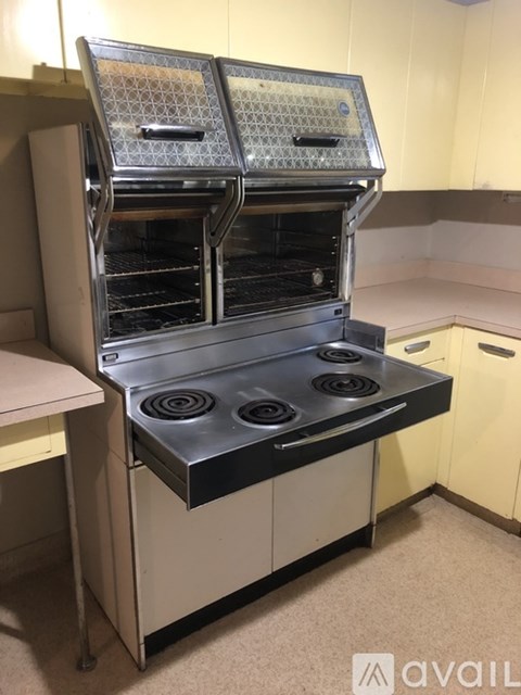 A commercial stove with a hood is available for purchase.