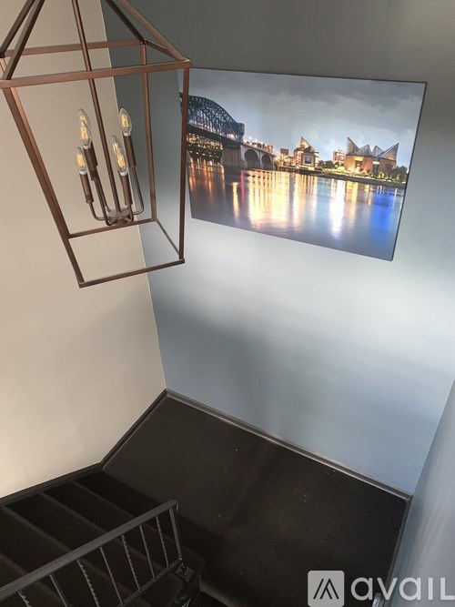 A picture of a cityscape is displayed on a wall.