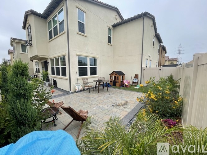 A house with a patio and a garden.