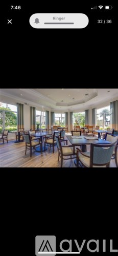 A dining area with tables and chairs is shown.