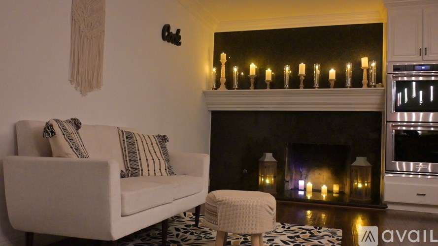 A modern kitchen with wooden floors and a bar area.