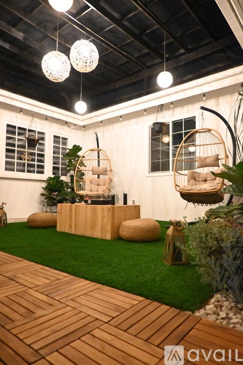 A house with a driveway and a garage is shown in the image.