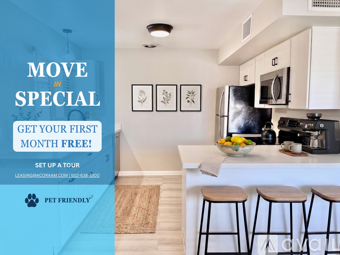 A kitchen with a sign offering a free first month for moving in.