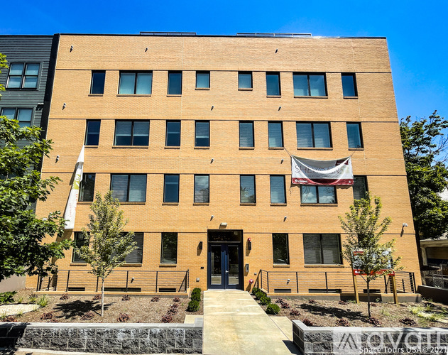 A building with a banner on the front.