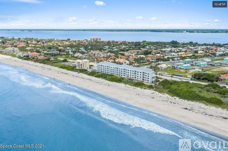 A beachfront view of Space Coast MLS 2021.