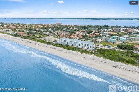 A beachfront view of Space Coast MLS 2021.