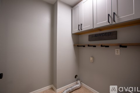 A bathroom with two sinks and a mirror.
