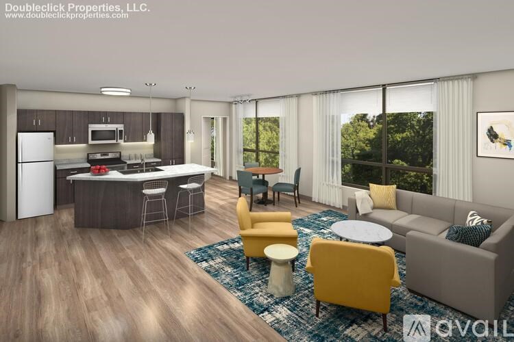 A modern kitchen and living room with a dining table and chairs.