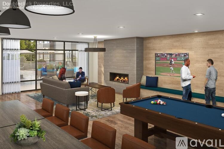A group of people are gathered in a room with a pool table and a television showing a baseball game.
